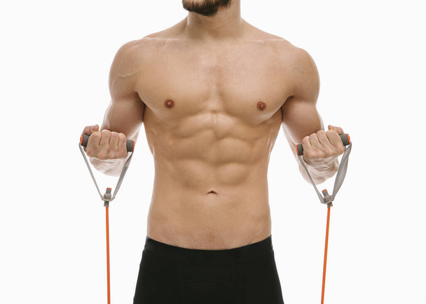 Fitness male posing in studio - Photo, image
