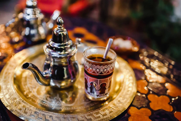 traditional Arabic tea cup, arab people drinking tea in Ramadan - 写真・画像