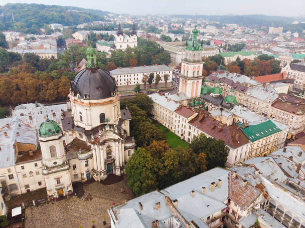 aerial view of old autumn european city at rainy overcast weather - Fotografie, Obrázek