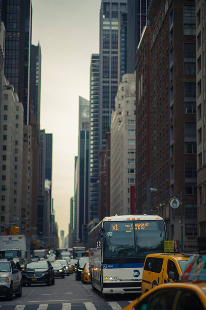 New York, NY, USA-MARCH 03, 2018: 59th Street near central park with cars and public transport - Φωτογραφία, εικόνα