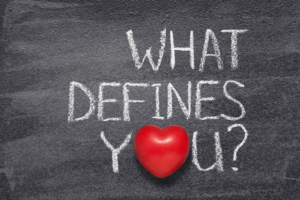 what defines you question written on chalkboard with red heart symbol - Photo, Image