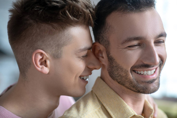 Close up picture of gay couple smiling happily - Φωτογραφία, εικόνα
