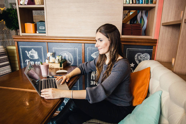 Girl working on laptop, Manager, freelancer, Internet use - Фото, изображение