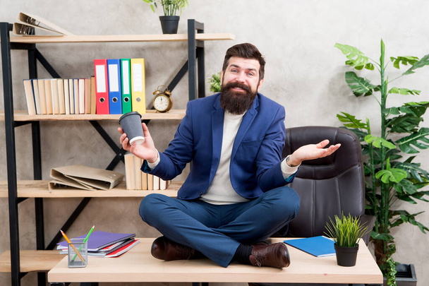 Feeling free. Prevent professional burnout. Way to relax. Meditation yoga. Self care. Relaxation techniques. Mental wellbeing and relax. Man bearded manager formal suit sit lotus pose relaxing - Fotó, kép