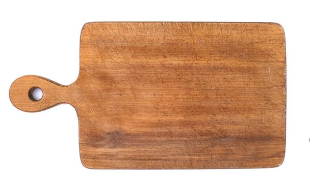 Wooden cutting board isolated on white background. Kitchen concept. - Photo, Image