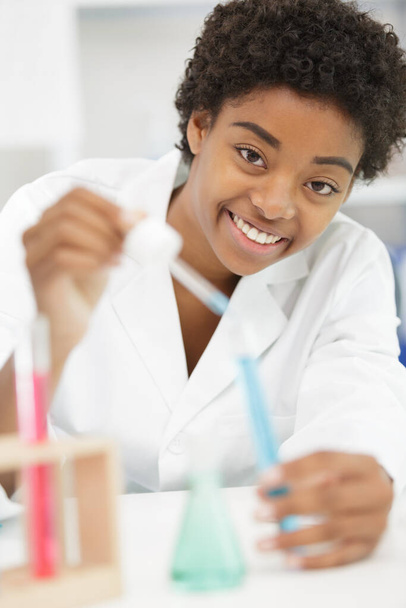 a beautiful female medical or scientific researcher in lab - Fotó, kép