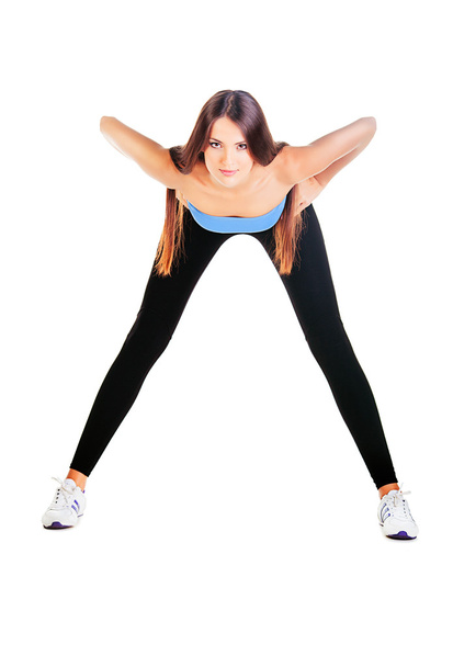 woman doing forward bending exercise - Fotoğraf, Görsel