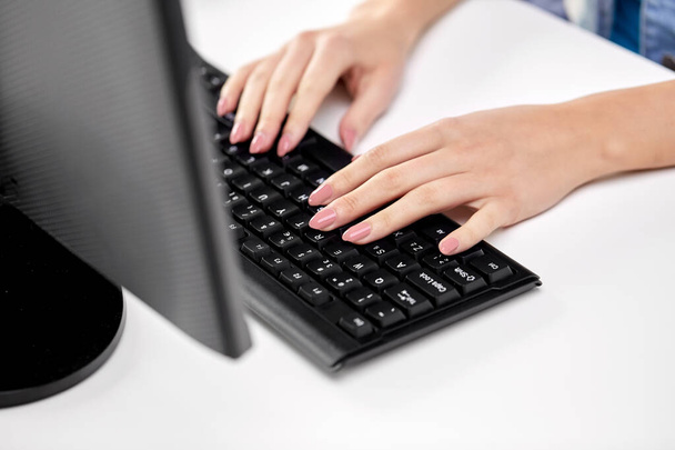 female hands typing on computer keyboard - Photo, Image