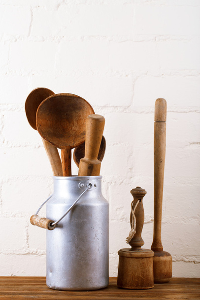 retro kitchen utensils tools on old wooden table in rustic style - Foto, Bild