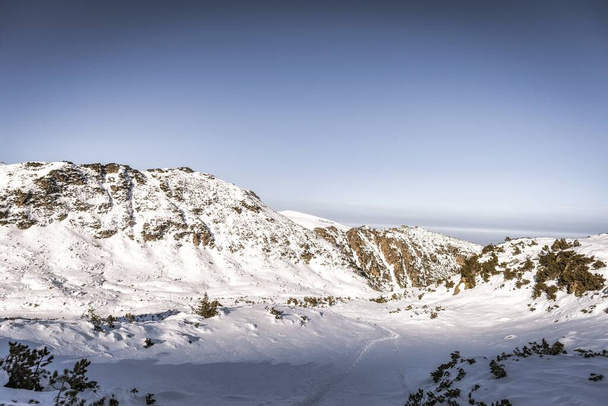 The snowy Kupens peaks in the Rila mountain national park, Malyovitsa region, Bulgaria - 写真・画像