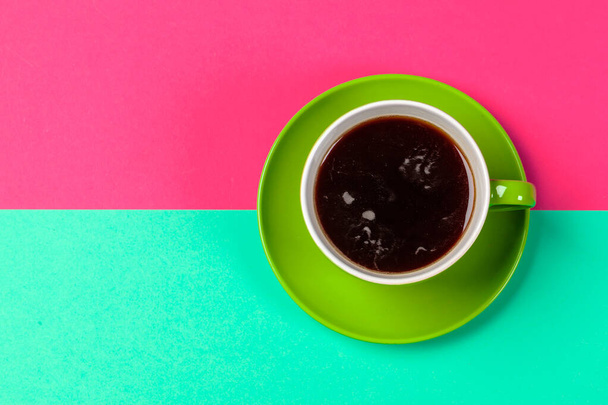 cup of coffee and saucer on color background - Fotoğraf, Görsel