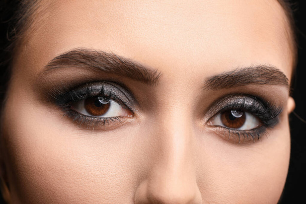 Young woman with beautiful makeup, closeup - Фото, зображення