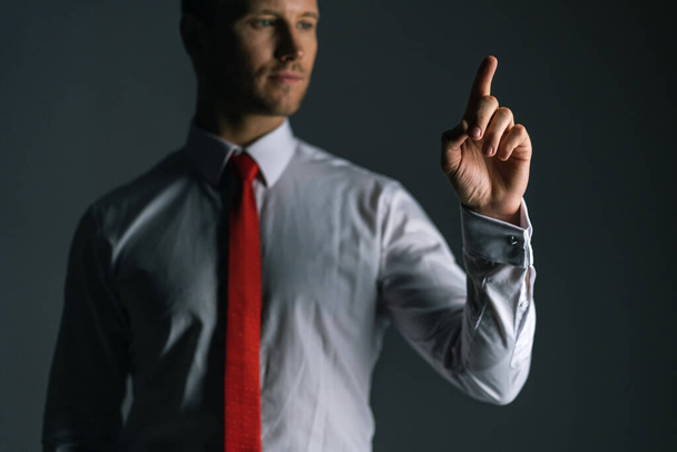 smart caucasian businessman white shirt red necktie finger point to draw or show something.presentation hand draw .creativity ideas concept - 写真・画像