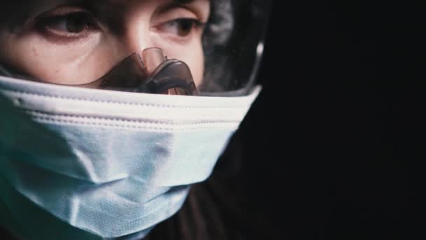 Virus. Girl in protective gauze mask and goggles against the flu virus. - Filmagem, Vídeo