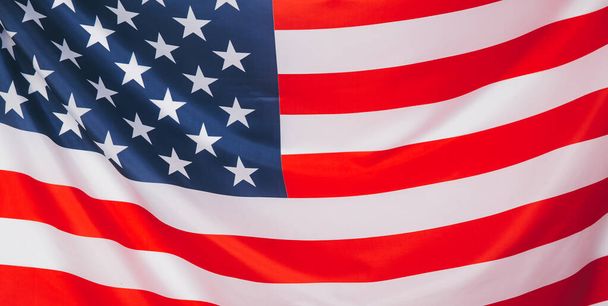 Close-up of American flag on white background. - Фото, зображення