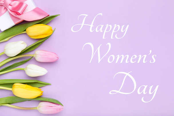 Text Happy Womens Day with tulip flowers and gift box on purple background - Foto, Imagen