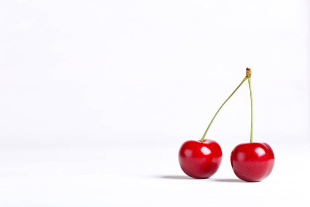 Sweet cherries on white background - Foto, imagen