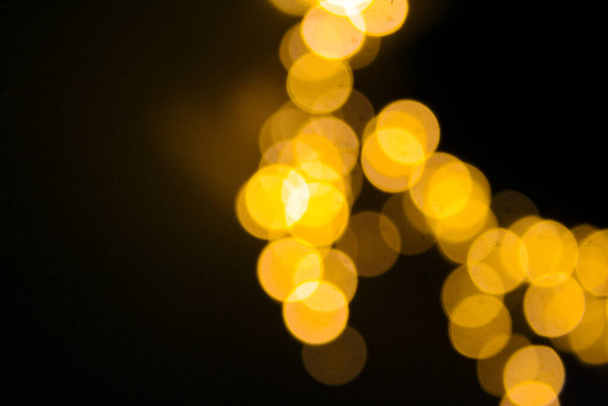 Christmas night new year lights. Blurred background. Background image - Foto, afbeelding