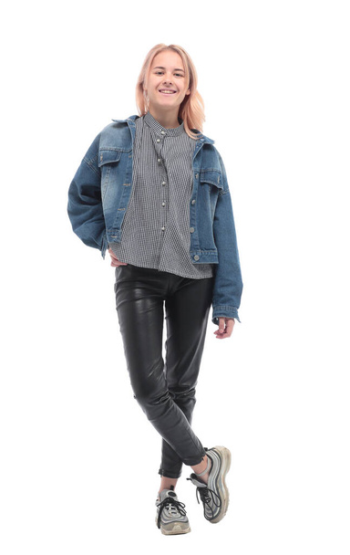 in full growth. serious stylish girl in a denim jacket - Foto, imagen