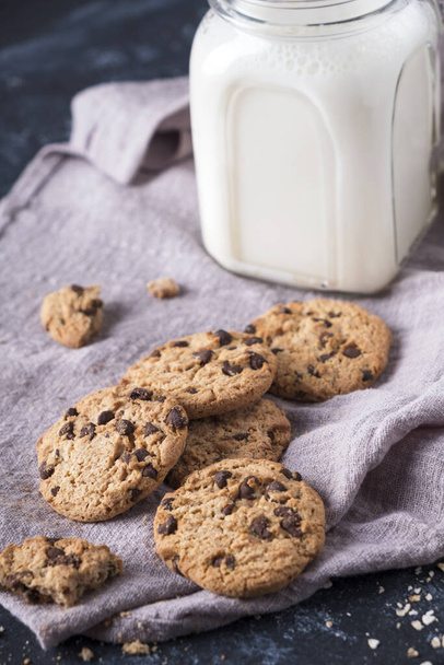 Chocolate chip cookies with glass of milk. Closeup - Photo, Image