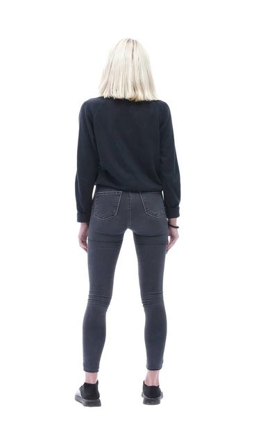rear view. modern young woman looking at blank screen. - Foto, afbeelding