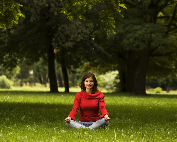Young woman doing yoga - Photo, Image