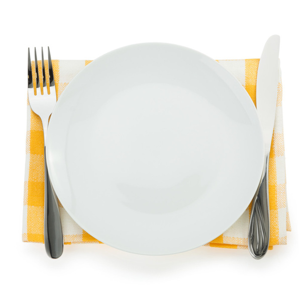 plate, knife and fork on white - Fotografie, Obrázek