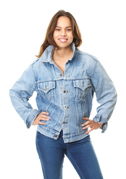 ブルー ジーンズのジャケットに笑みを浮かべて若い女性の肖像画 - 写真・画像