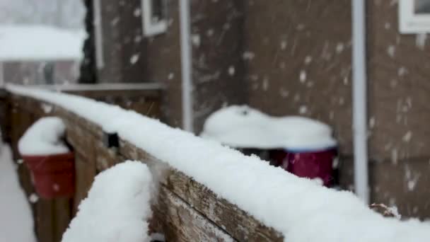 Snow Storm Over Close Up of Fence in Suburban Backyard - Footage, Video