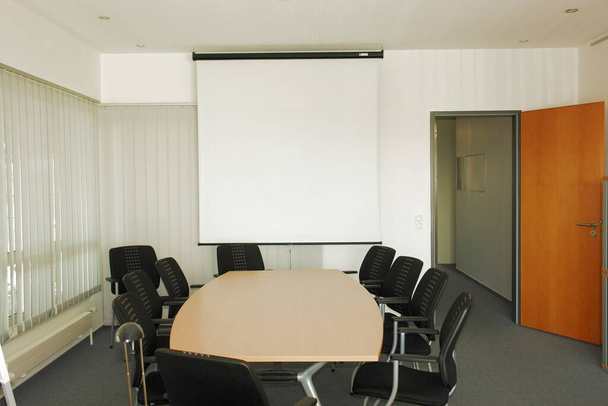 conference room with a blank whiteboard and a meeting - Foto, Imagem