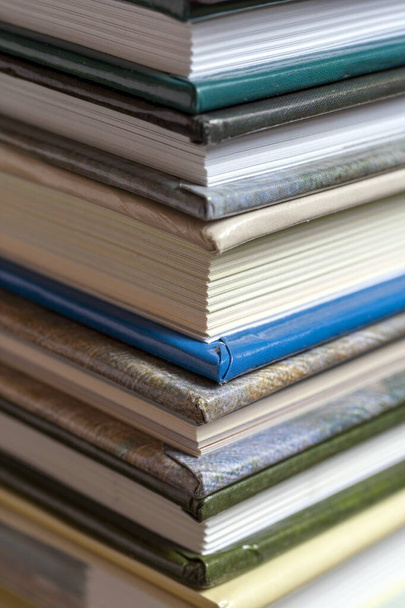 Close up shot of stack of books - Фото, изображение