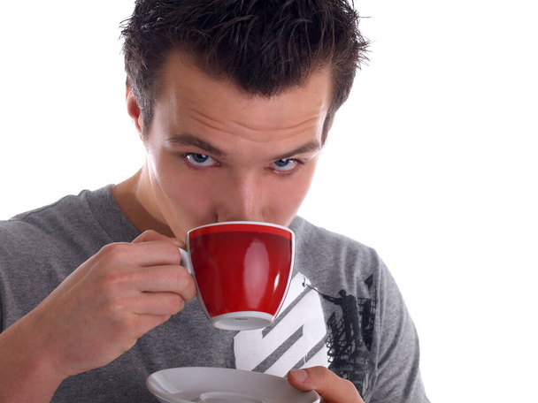 young man drinking coffee - 写真・画像