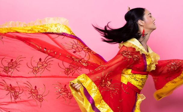 Red Gold lace of Chinese Traditional Costume Opera or South East Asia Reddish Dress in Asian Woman with decoration portrait in many poses under Studio lighting Pink background, collage group pack - 写真・画像