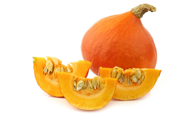 Orange pumpkins and some cut pieces - Photo, Image