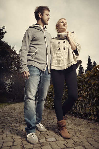 Lovely couple walking in park - Valokuva, kuva