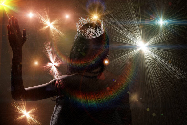 Portrait of Miss Pageant Beauty Contest in open back Evening fur Gown dress sparkle light Diamond Crown, Asian Woman fashion make up black hair style, spotlight stage spot winner turn back side view - Fotó, kép