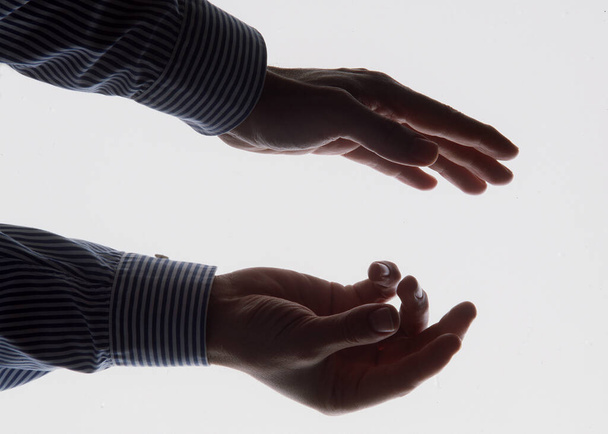 close up of male hand holding a fist - Foto, Imagem
