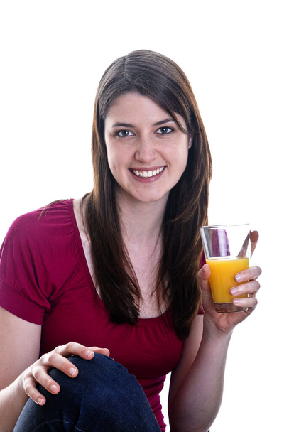 Woman drinks a glass of juice - Zdjęcie, obraz