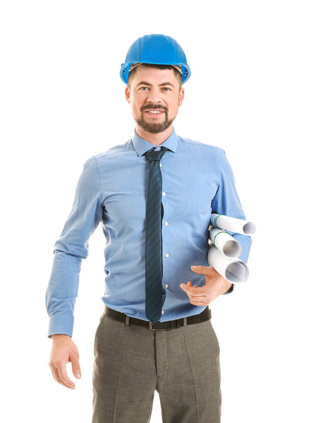 Male engineer with drawings on white background - Photo, Image