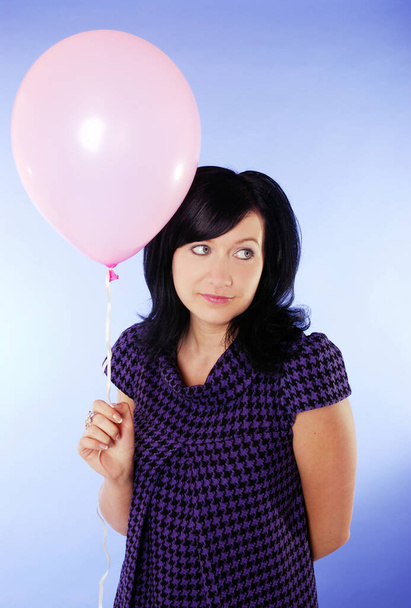 Young woman with balloon - Fotó, kép