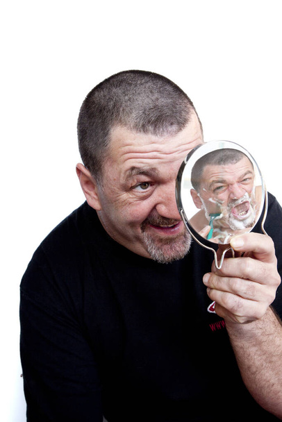 man with magnifying glass isolated on white - Valokuva, kuva