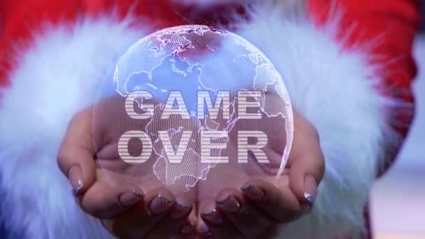 Handen vasthouden planeet met tekst Game Over - Video