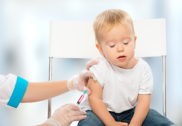 doctor does injection child vaccination baby - Foto, Imagen