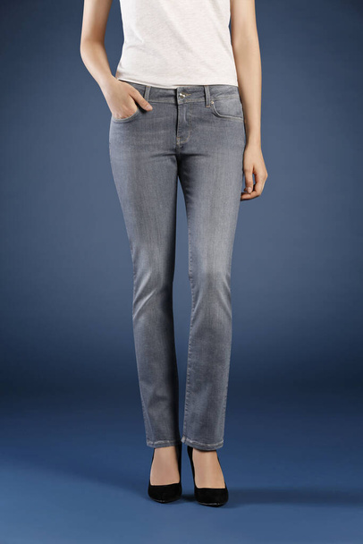 cropped view of woman posing in jeans in studio, fashion concept  - Photo, Image