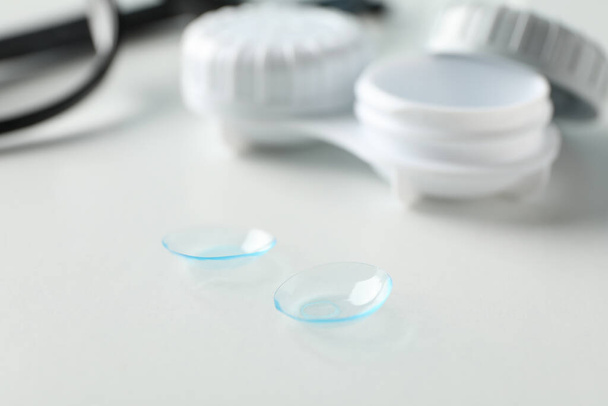Glasses, contact lenses and case on white background, close up - Zdjęcie, obraz
