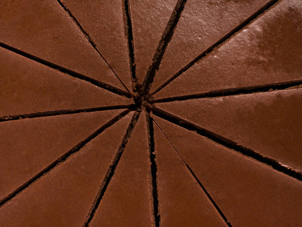 Chocolate cake sliced from above. Close up texture. - Zdjęcie, obraz