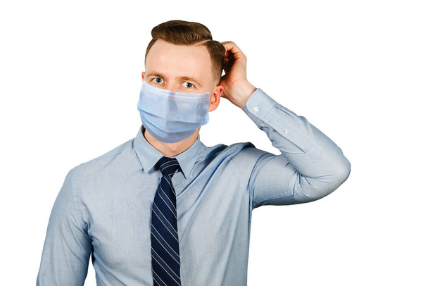 business man think, man in blue shirt and tie wearing a protective face mask prevent virus infection, on white isolated background - Photo, image