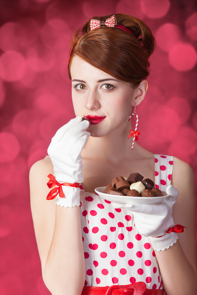 Belles femmes rousses avec des bonbons
. - Photo, image