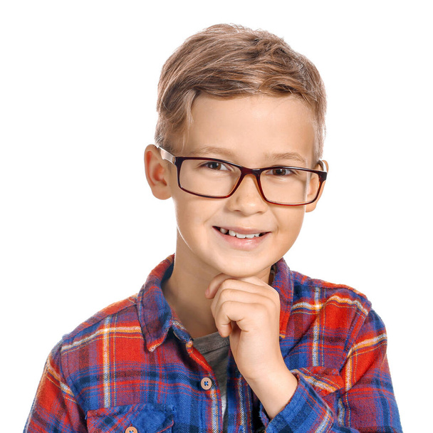 Cute little boy with eyeglasses on white background - Foto, imagen
