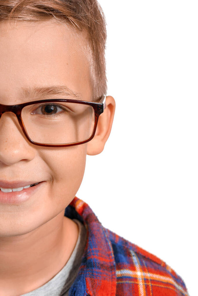 Cute little boy with eyeglasses on white background, closeup - Valokuva, kuva